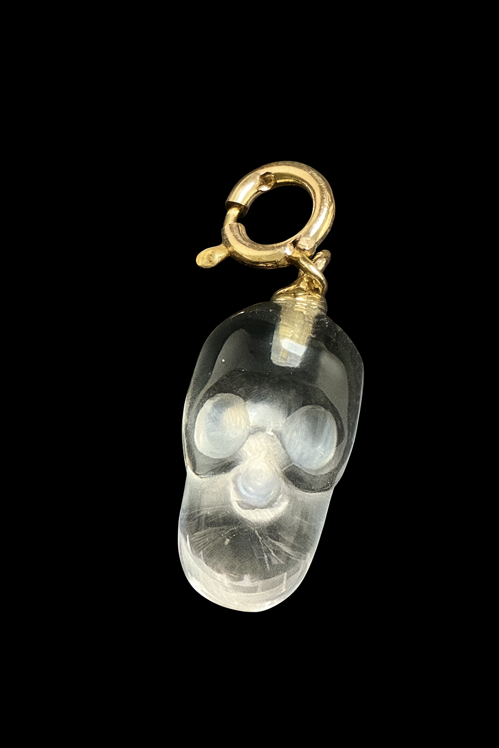 Rock crystal skull charm