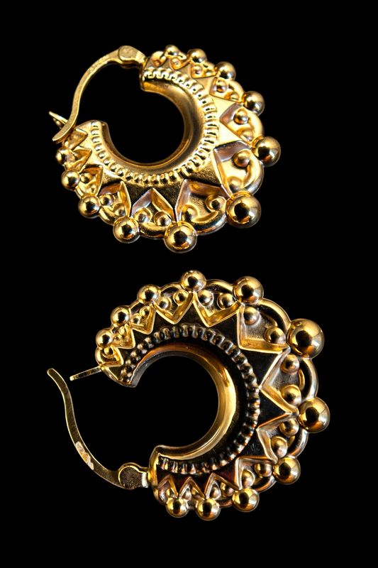 Bohemian-inspired  gold crescent hoops