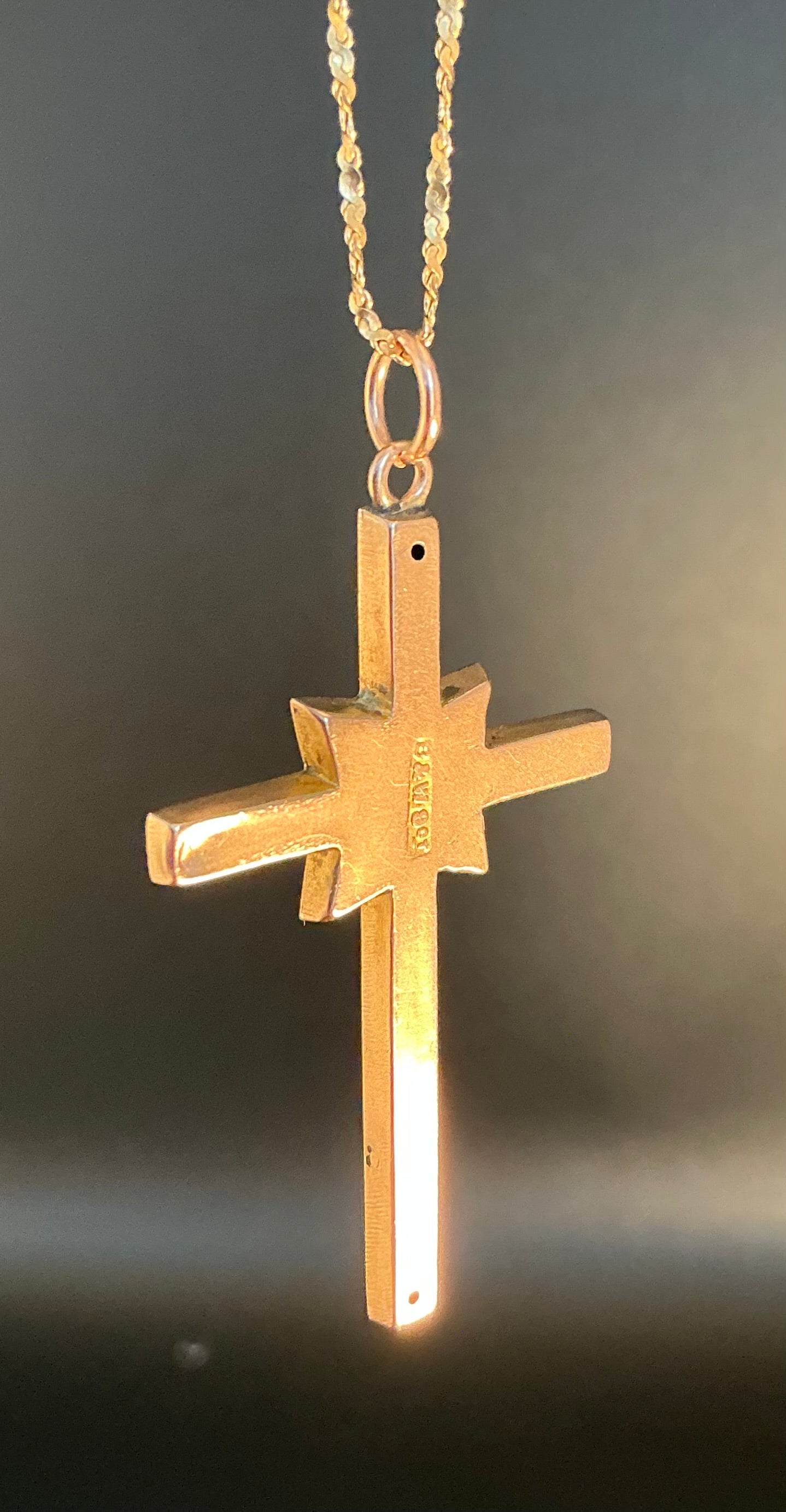Gold cross pendant